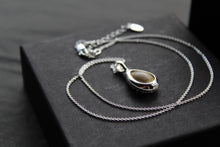 Load image into Gallery viewer, Cowrie Shell Encased in Silver