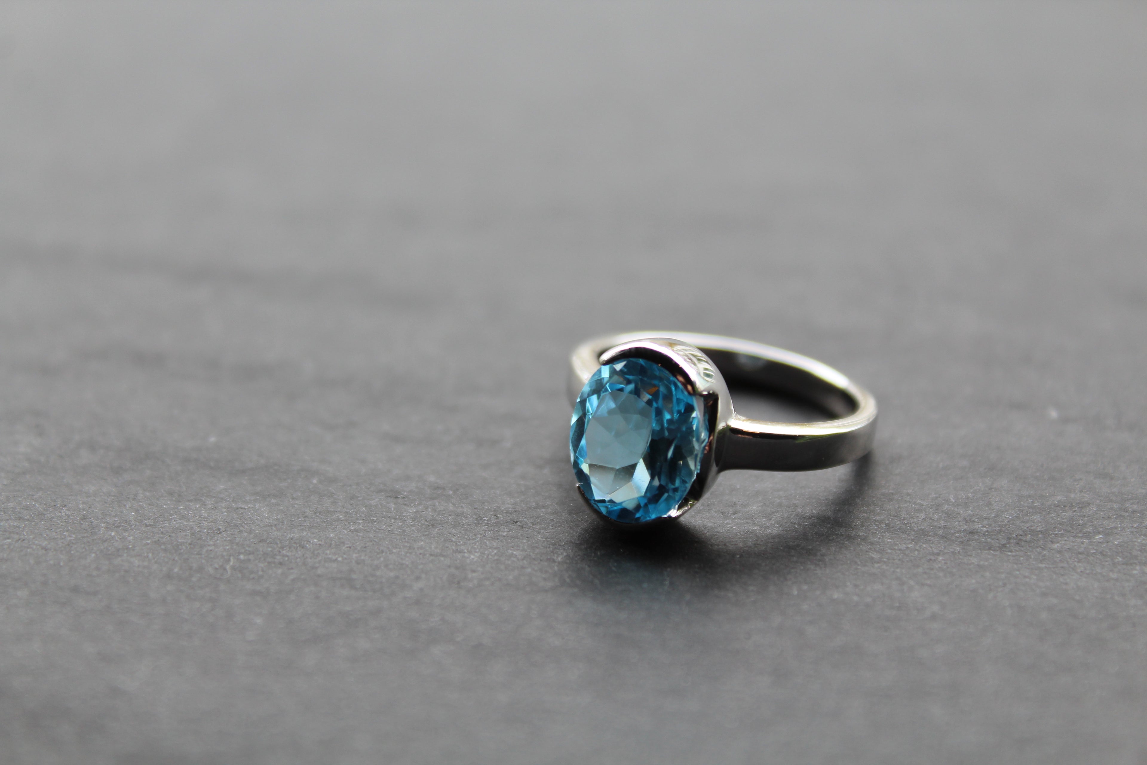 Blue Topaz Cocktail Ring with Rhodium Plate