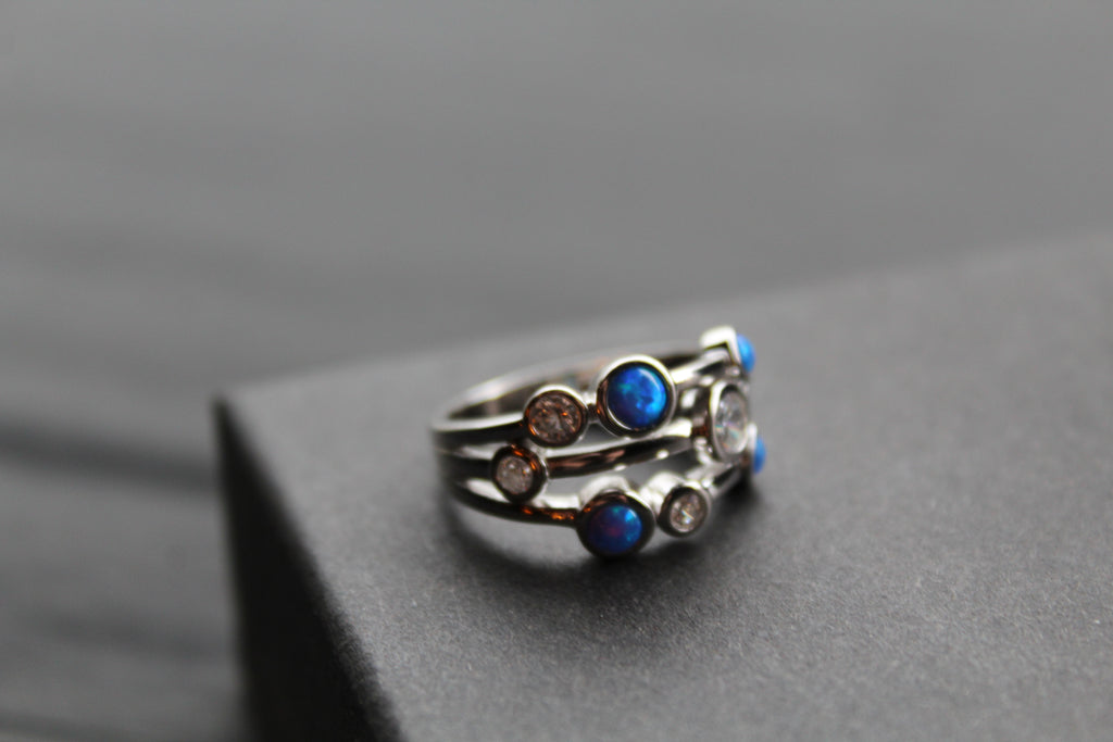 Cubic Zirconia & Blue Opalique Triple Band Ring