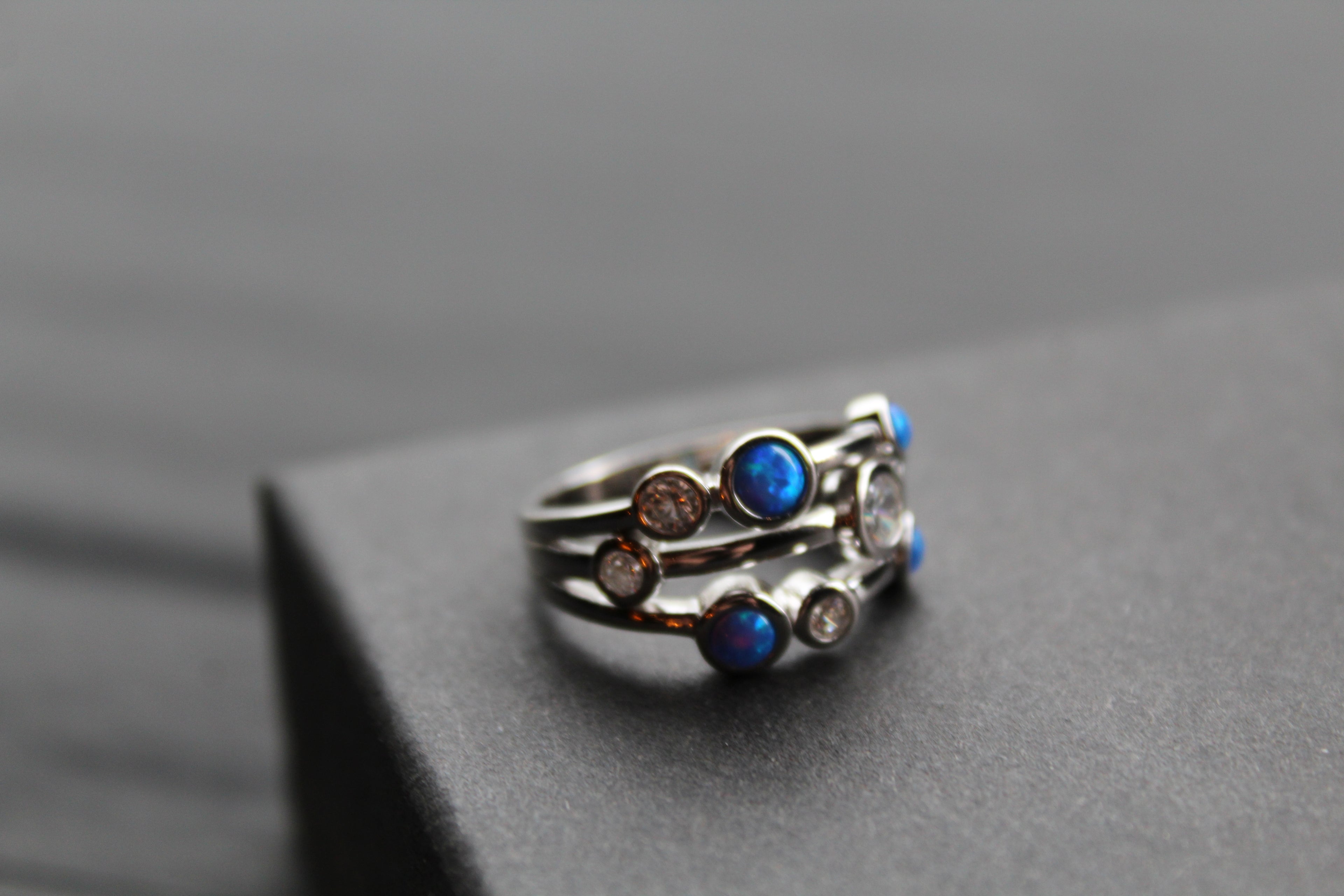 Cubic Zirconia & Blue Opalique Triple Band Ring