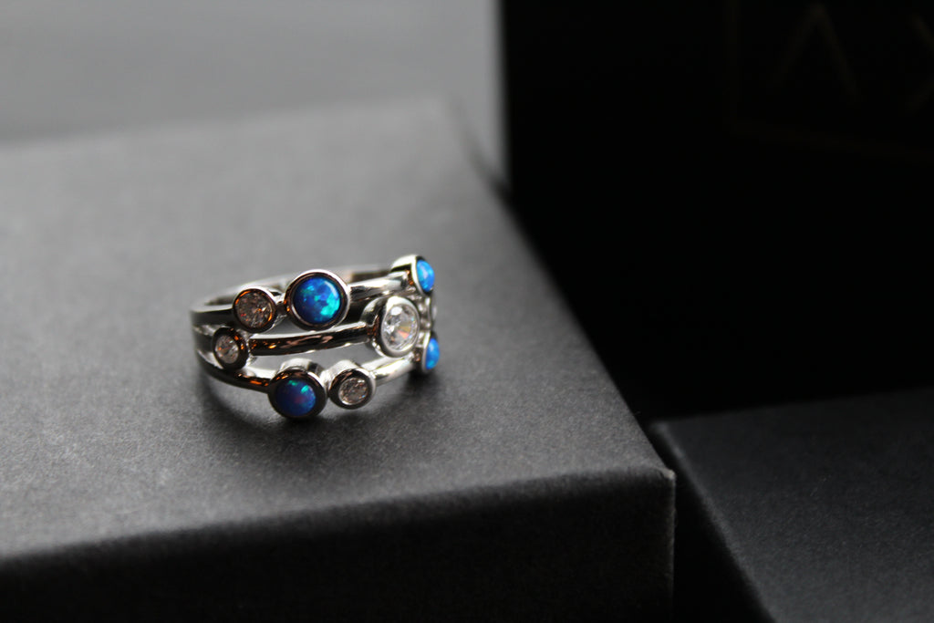 Cubic Zirconia & Blue Opalique Triple Band Ring