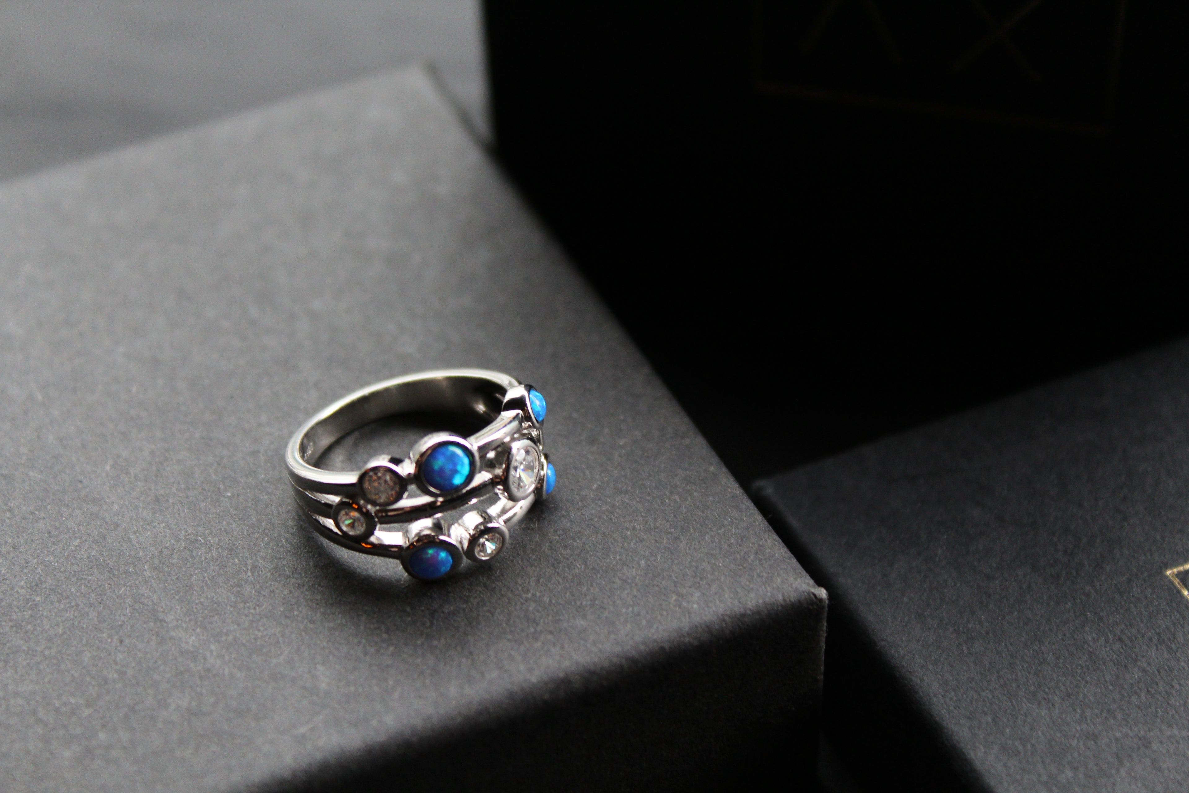 Cubic Zirconia & Blue Opalique Triple Band Ring