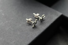 Load image into Gallery viewer, Flat Dragon Silver Studs

