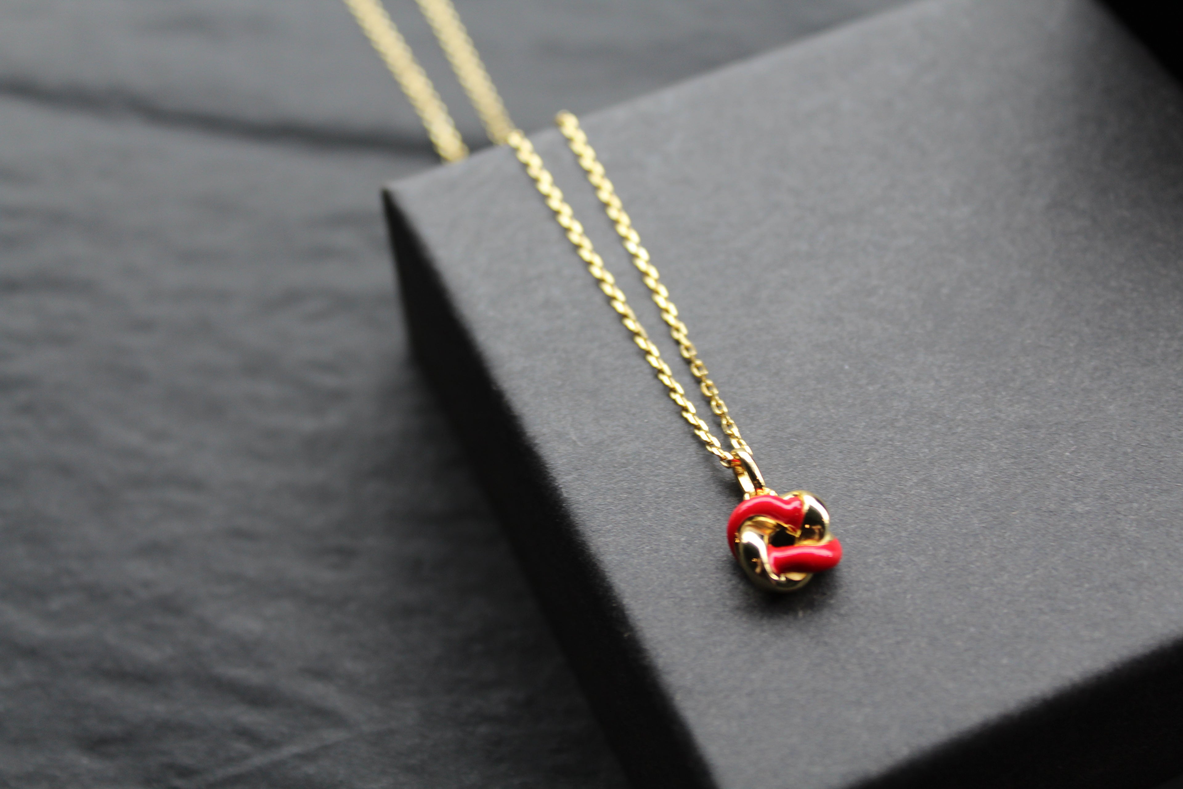 Gold Plated Ruby Red Enamel Knot Necklace