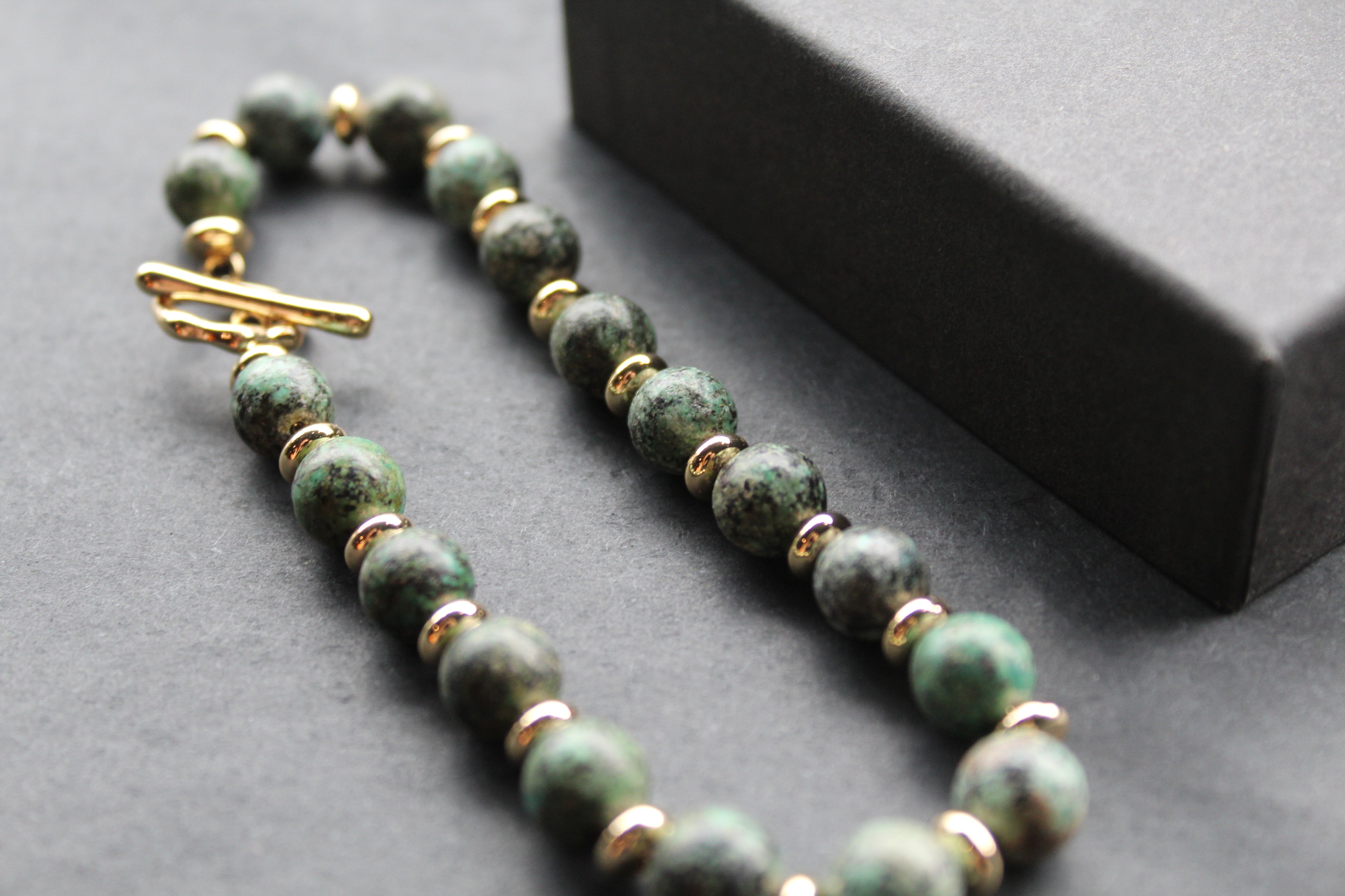 Men's Gold Tone African Turquoise Crystal Bracelet