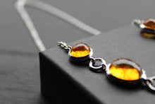 Load image into Gallery viewer, Multi-Shape Statement Necklace with Amber
