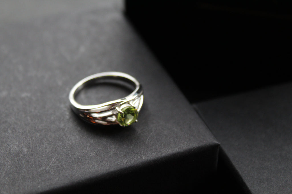 Multi Strand Ring with Faceted Peridot