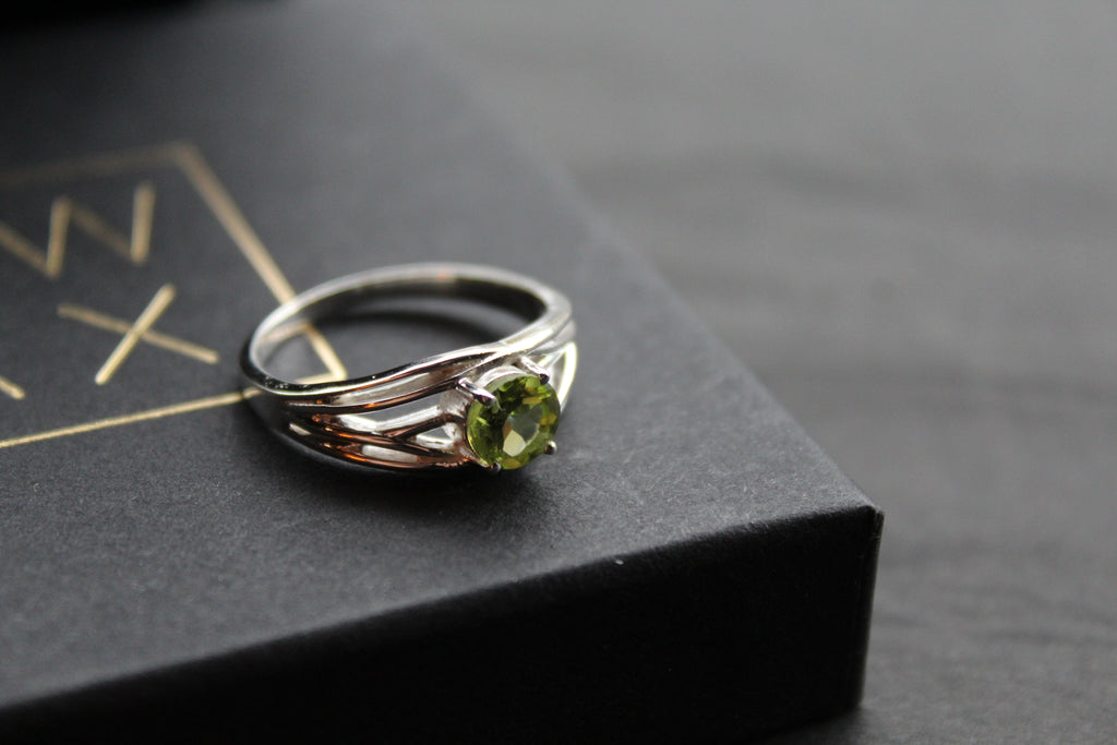 Multi Strand Ring with Faceted Peridot