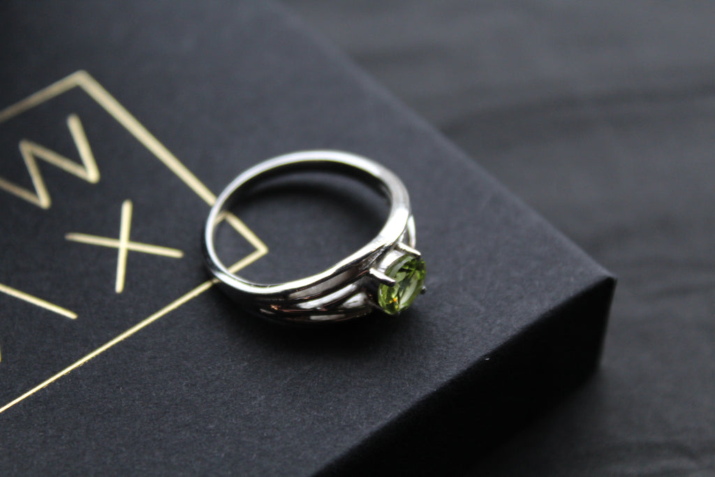 Multi Strand Ring with Faceted Peridot
