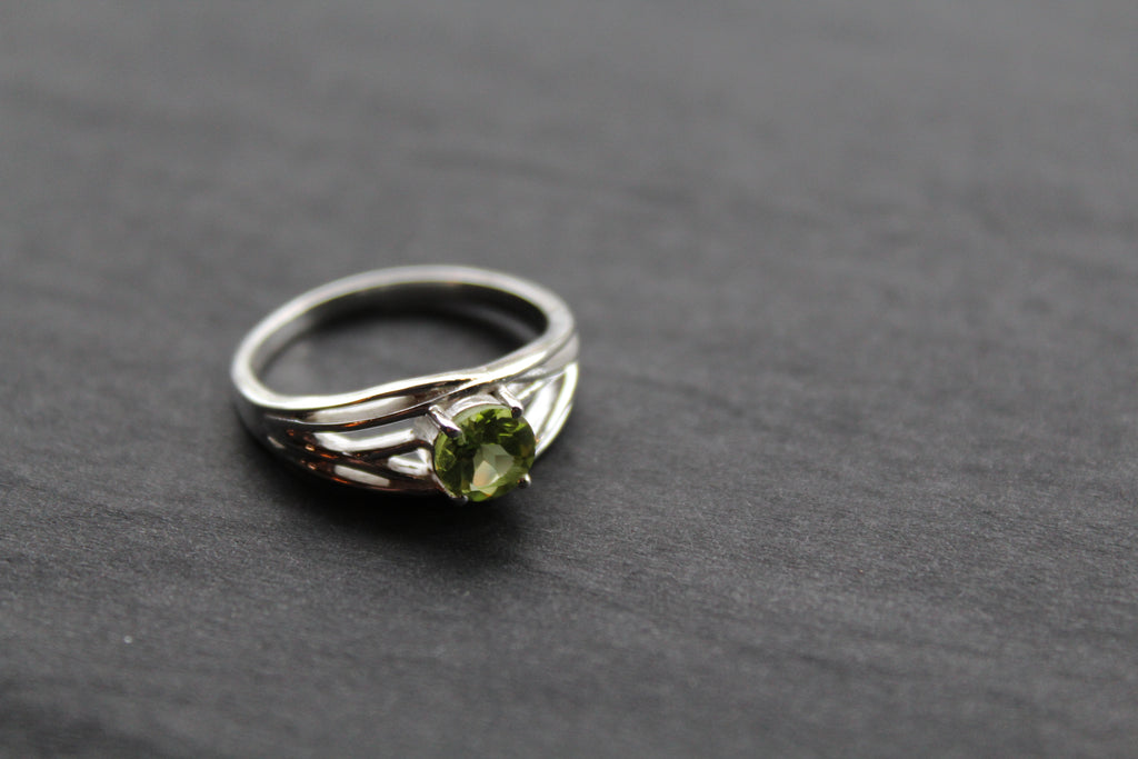 Multi Strand Ring with Faceted Peridot