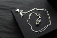 Load image into Gallery viewer, Peridot Trinity Knot Necklace
