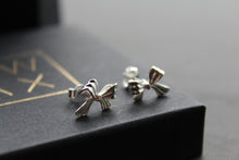 Load image into Gallery viewer, Silver Ribbon Bow Studs
