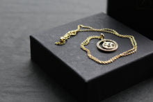 Load image into Gallery viewer, Small Sunburst Circle with Cubic Zirconia Halo Surround

