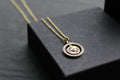 Small Sunburst Circle with Cubic Zirconia Halo Surround
