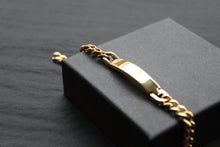 Load image into Gallery viewer, Stainless steel I.D curb bracelet with gold IP plating.
