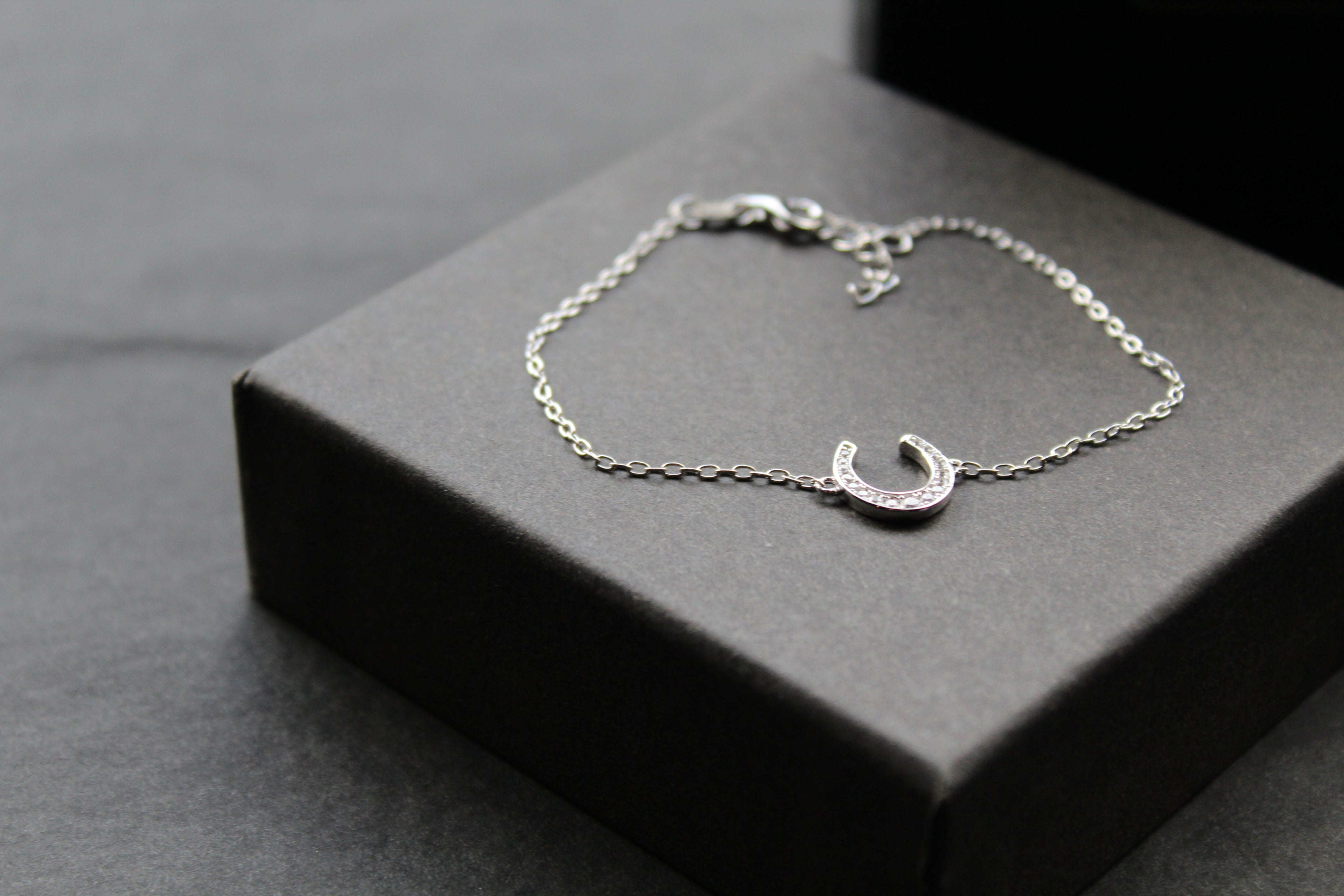 Sterling Silver Rhodium Plated CZ Horseshoe Bracelet