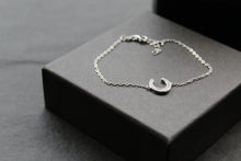 Load image into Gallery viewer, Sterling Silver Rhodium Plated CZ Horseshoe Bracelet
