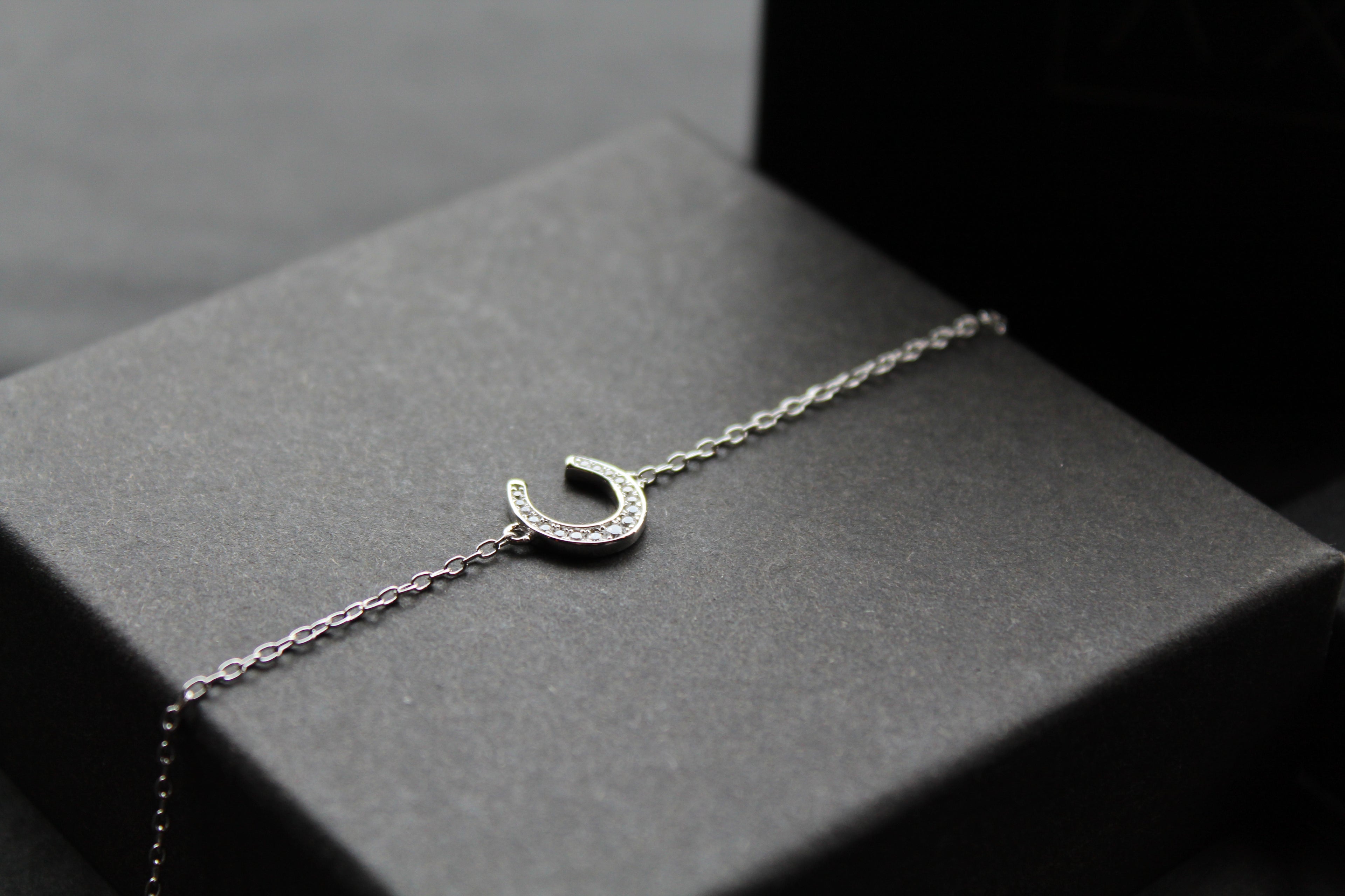 Sterling Silver Rhodium Plated CZ Horseshoe Bracelet