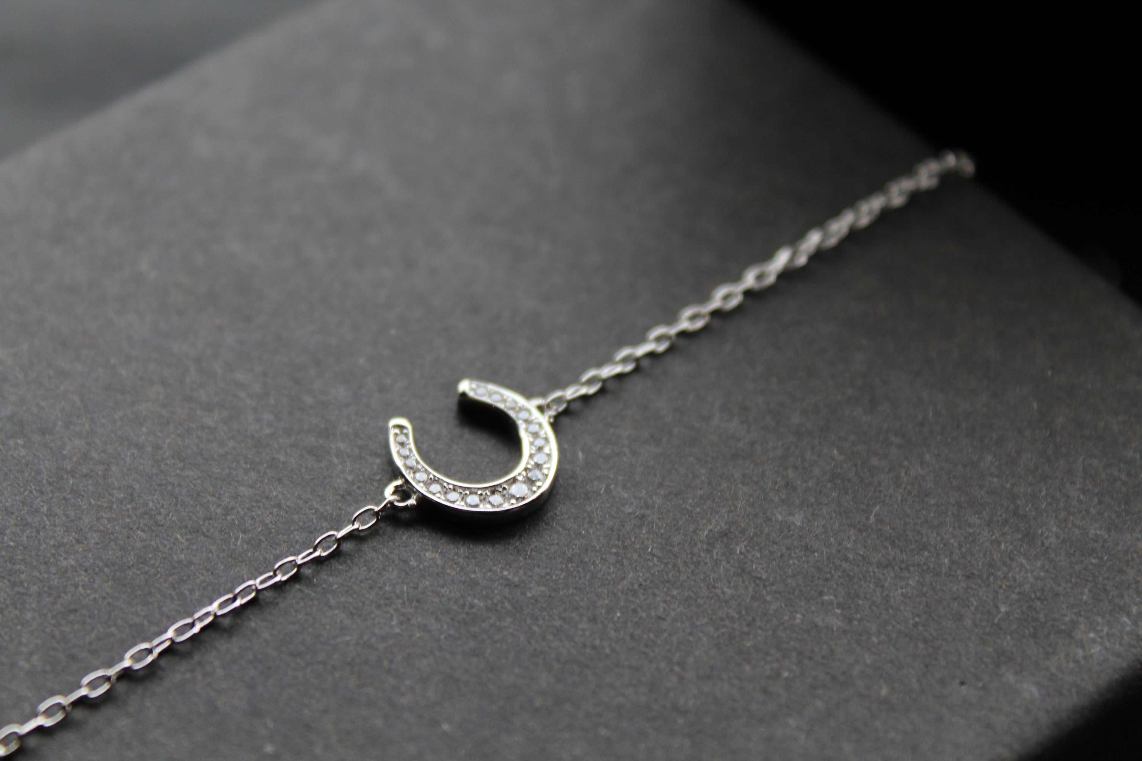 Sterling Silver Rhodium Plated CZ Horseshoe Bracelet