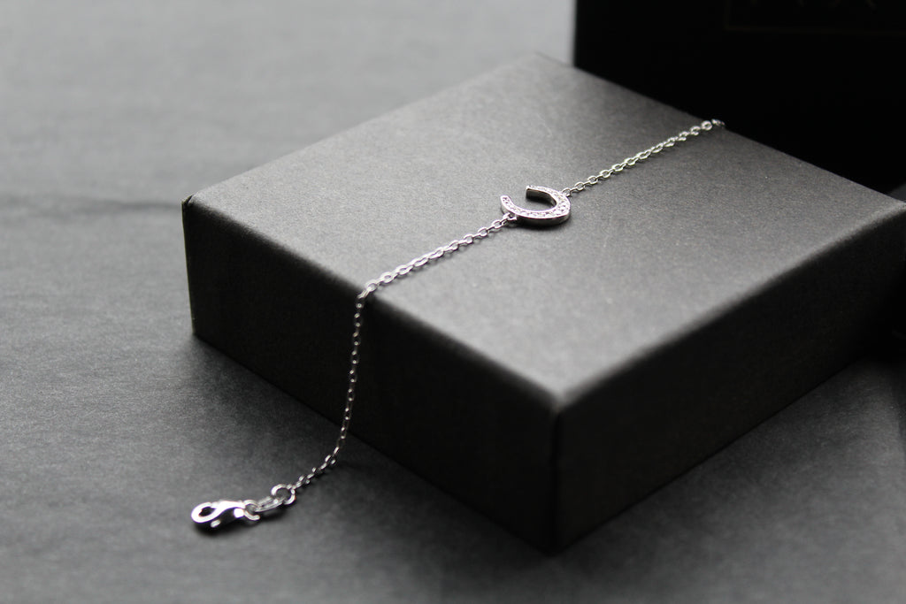 Sterling Silver Rhodium Plated CZ Horseshoe Bracelet