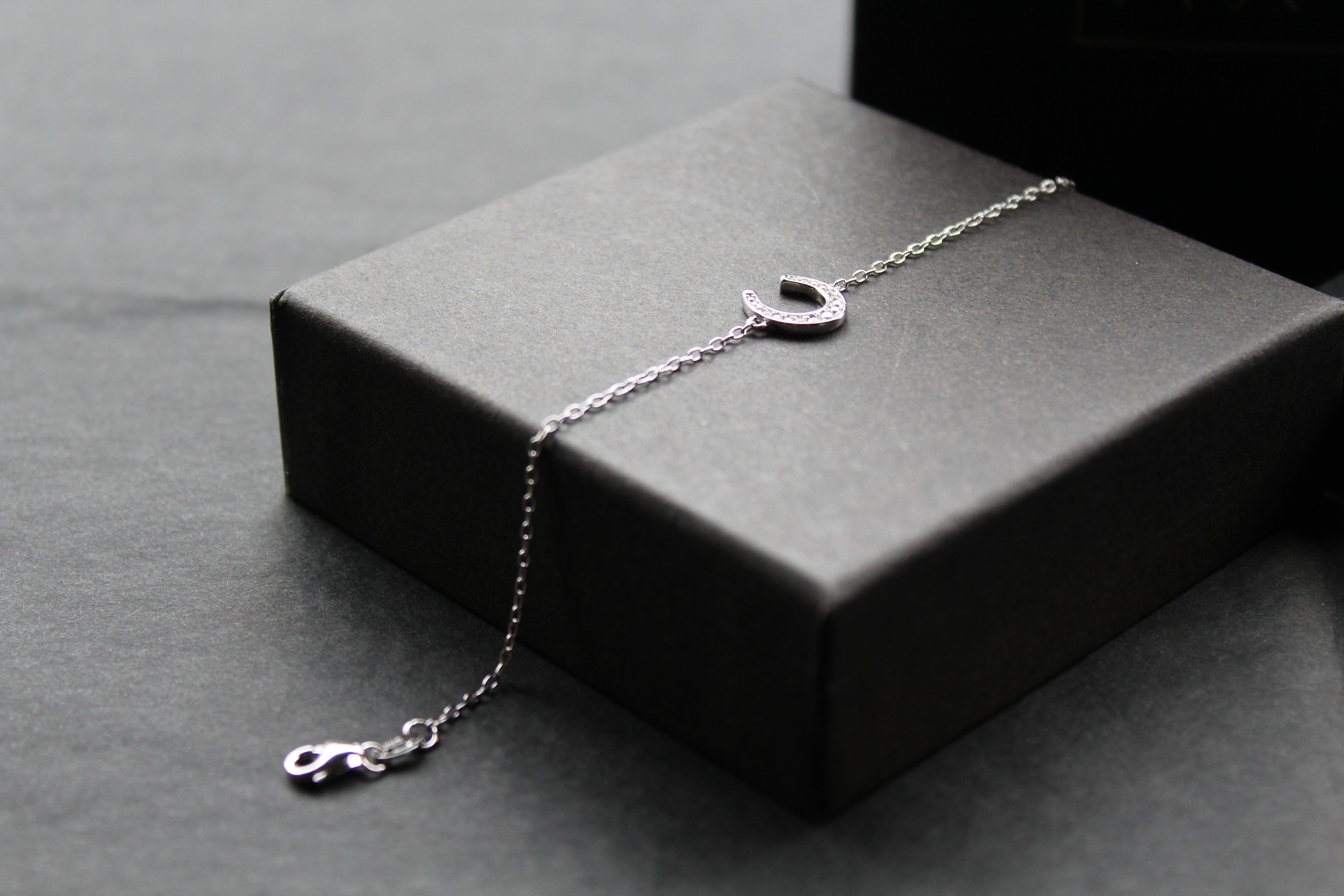 Sterling Silver Rhodium Plated CZ Horseshoe Bracelet