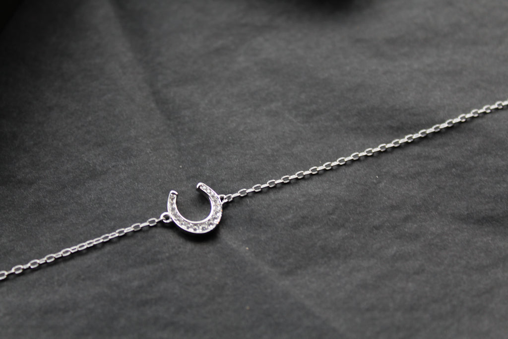 Sterling Silver Rhodium Plated CZ Horseshoe Bracelet
