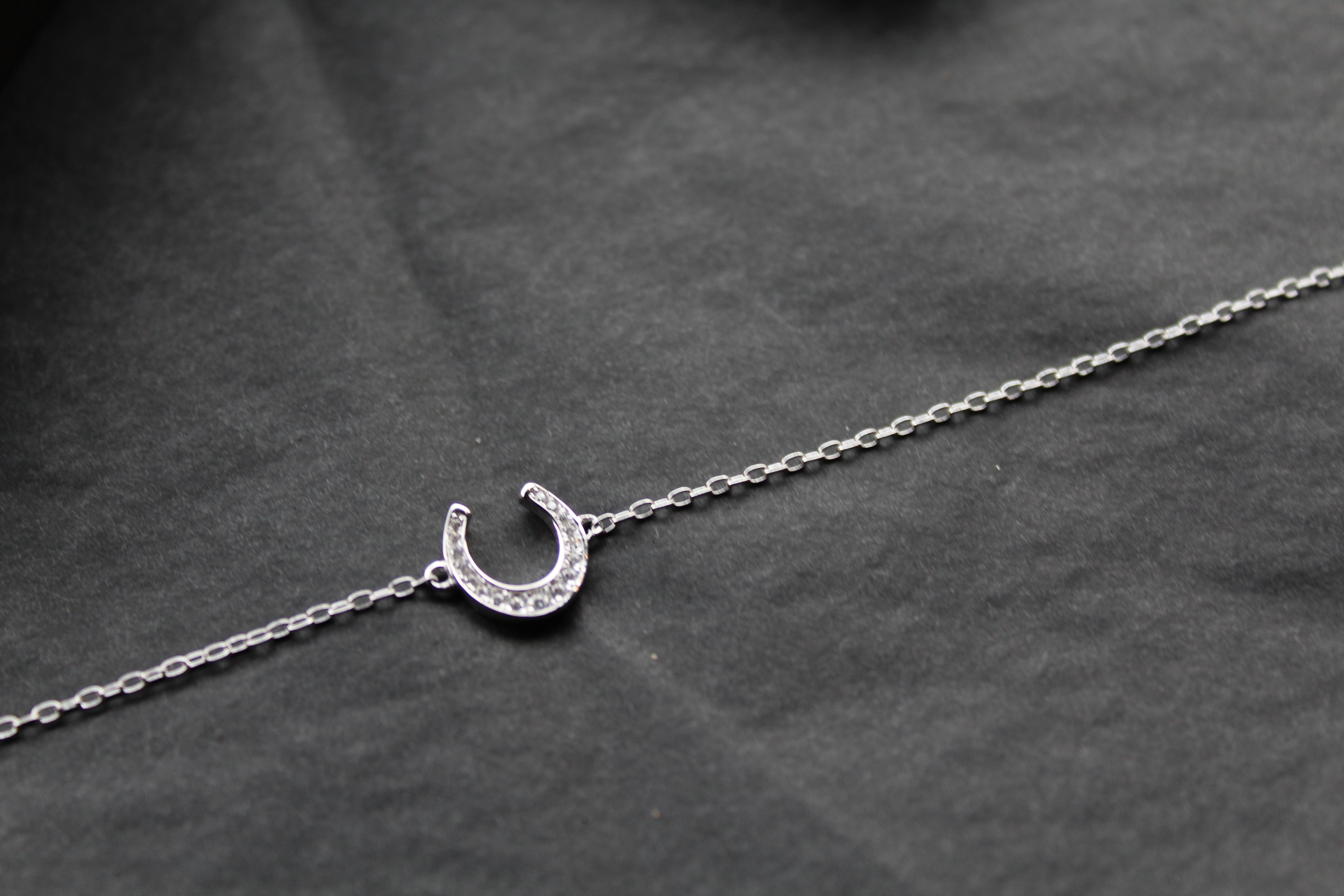 Sterling Silver Rhodium Plated CZ Horseshoe Bracelet