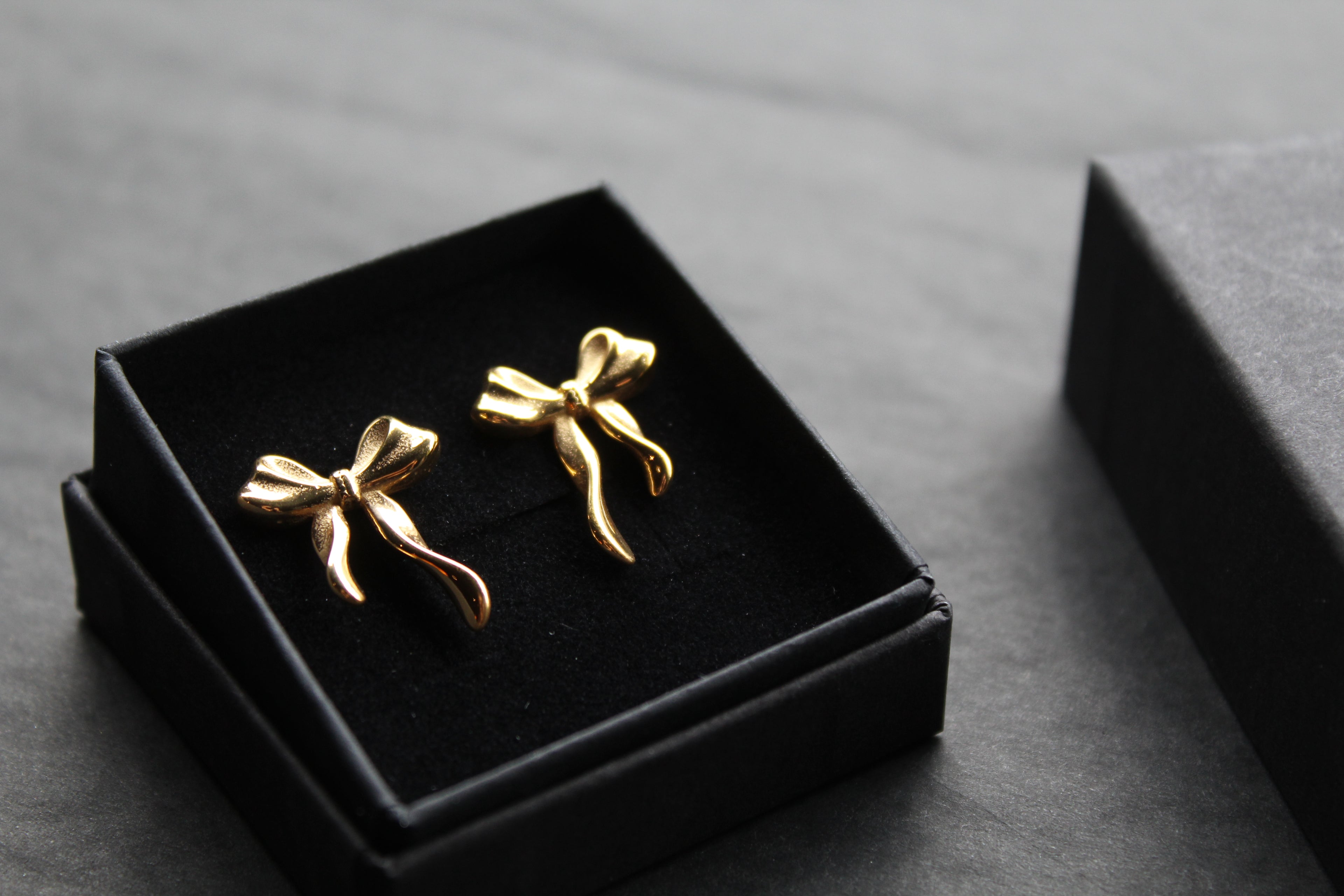 The Serenity Ribbon Bow Dainty Stud Earrings