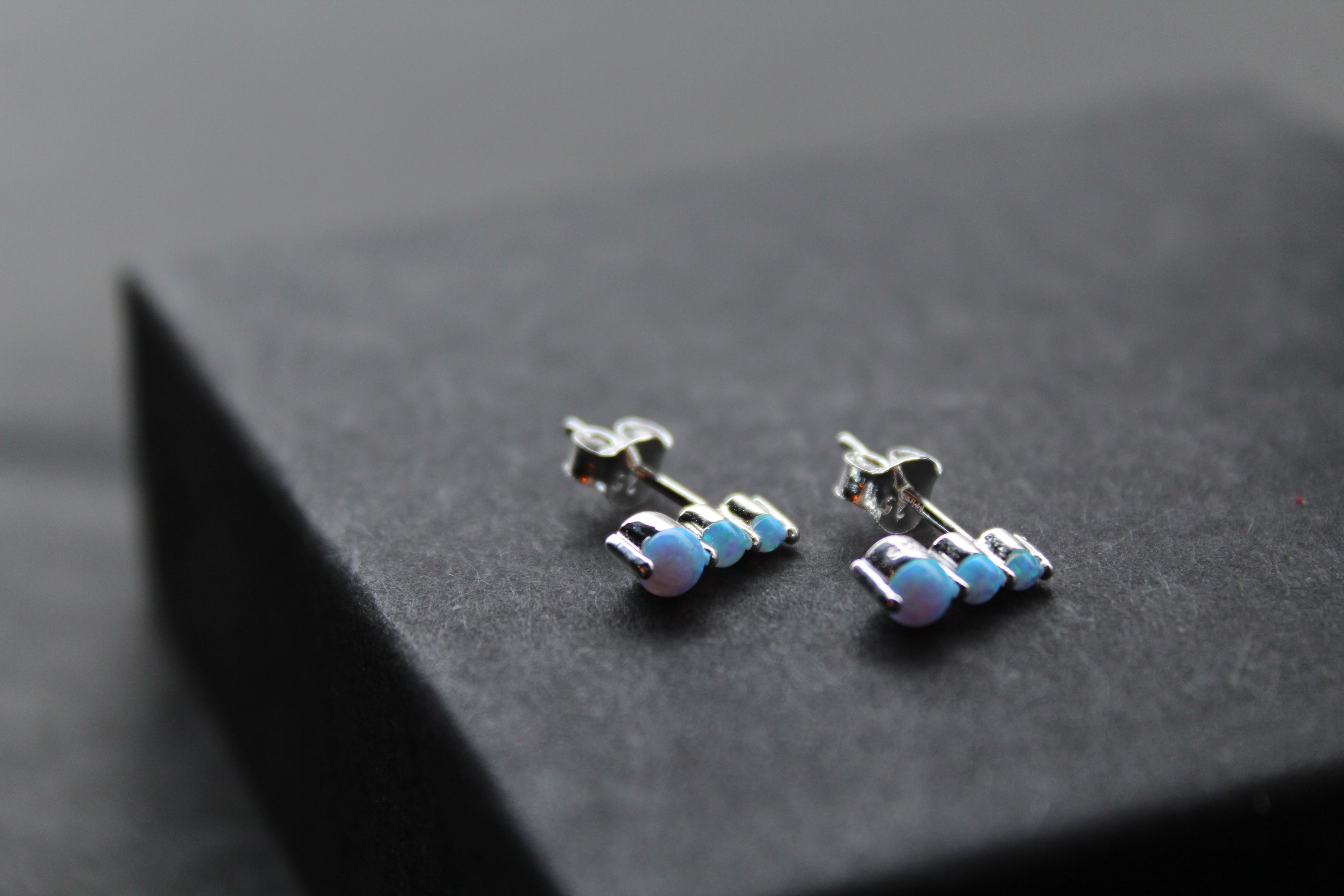 Triple Blue Opalique Claw Set Studs