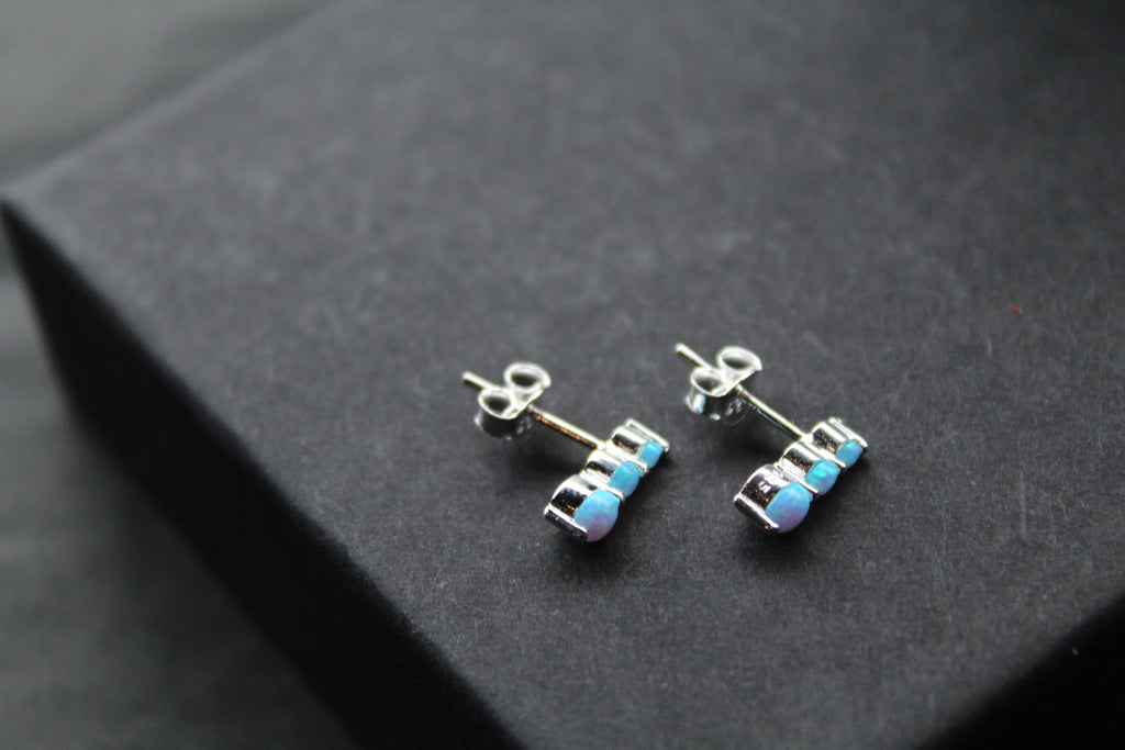 Triple Blue Opalique Claw Set Studs