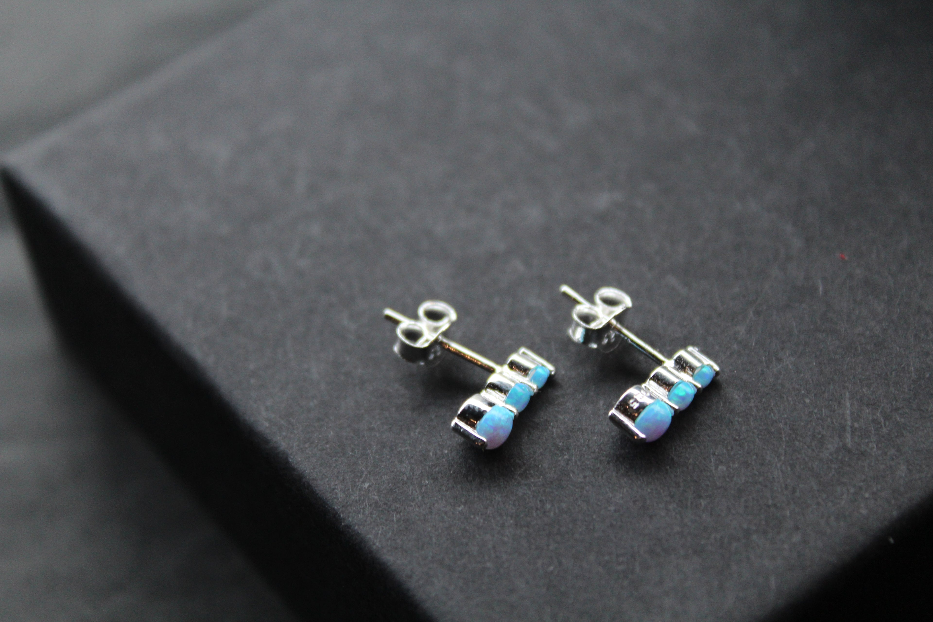 Triple Blue Opalique Claw Set Studs