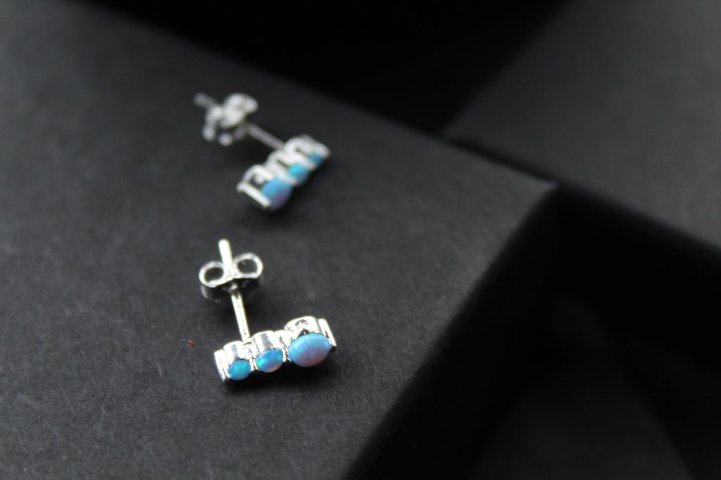 Triple Blue Opalique Claw Set Studs