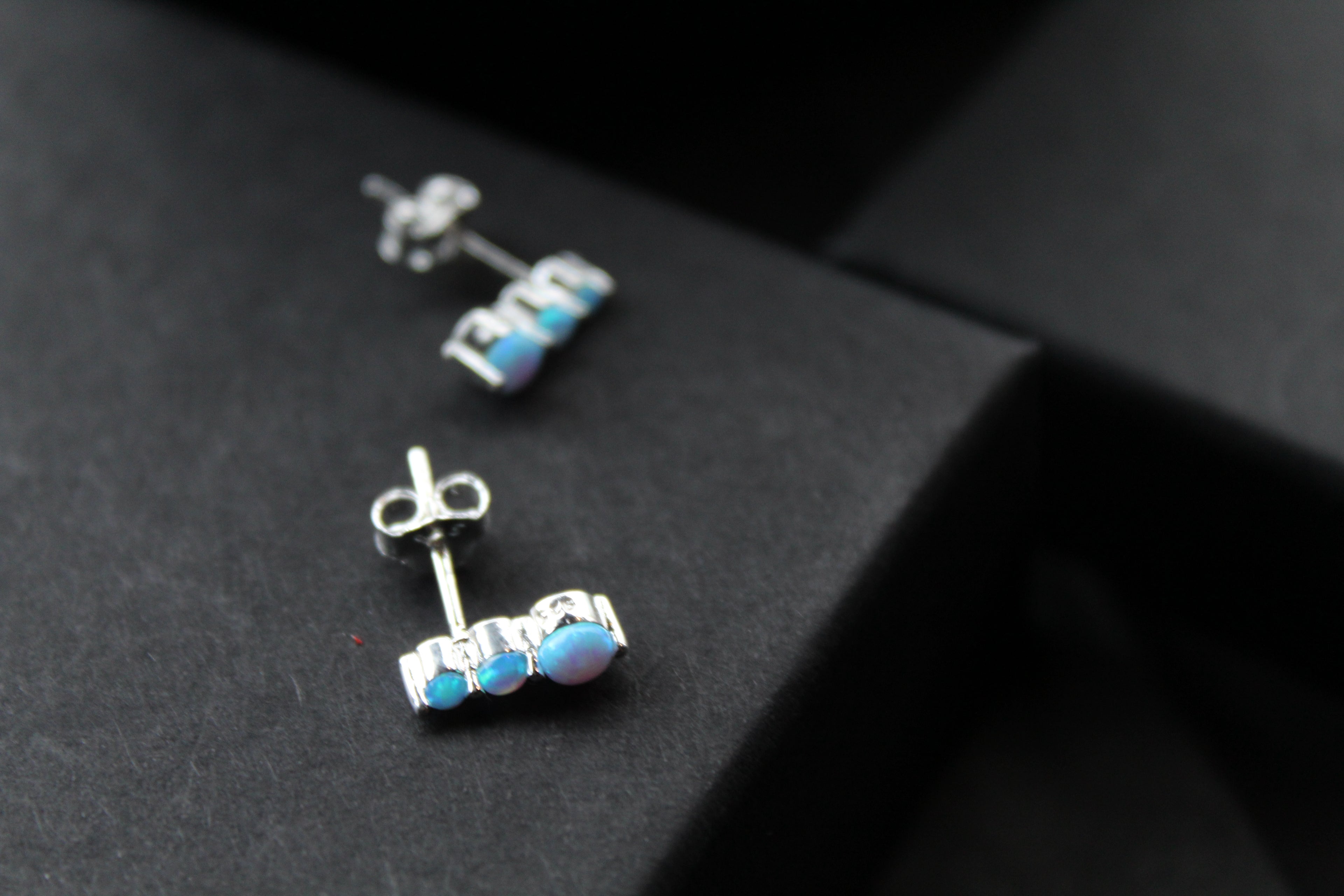 Triple Blue Opalique Claw Set Studs