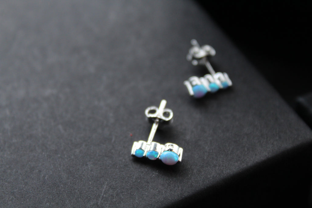 Triple Blue Opalique Claw Set Studs