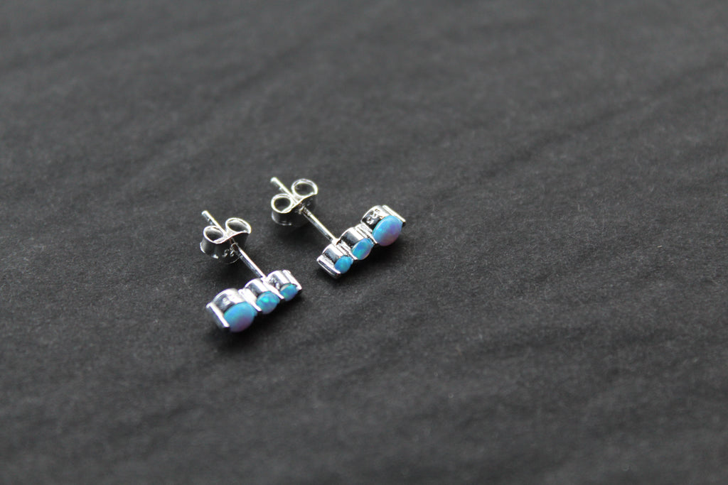 Triple Blue Opalique Claw Set Studs