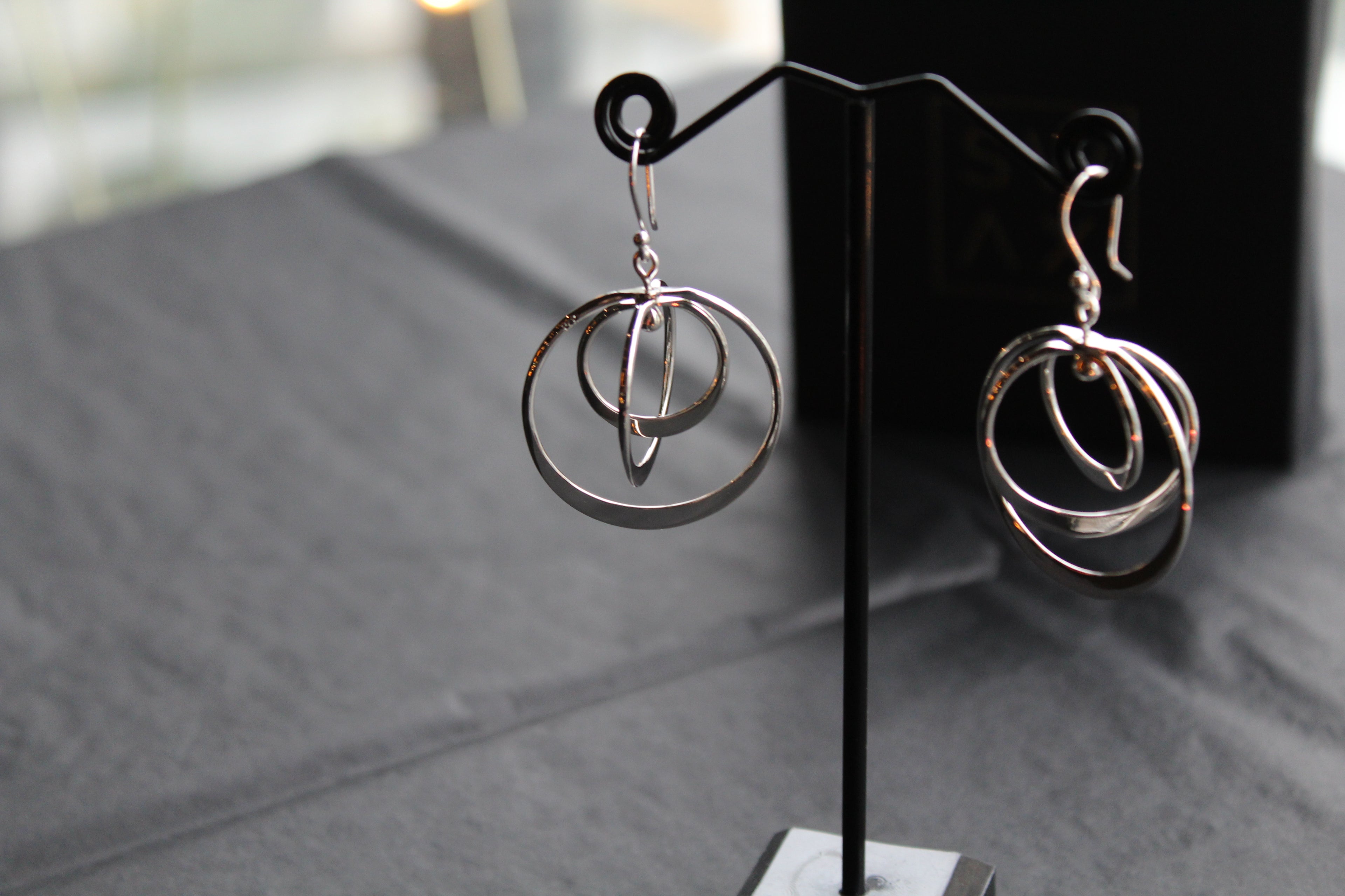 Twirling Silver Hoops Earrings