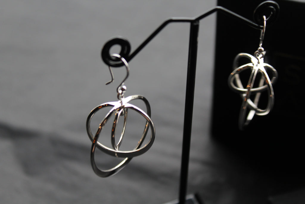 Twirling Silver Hoops Earrings