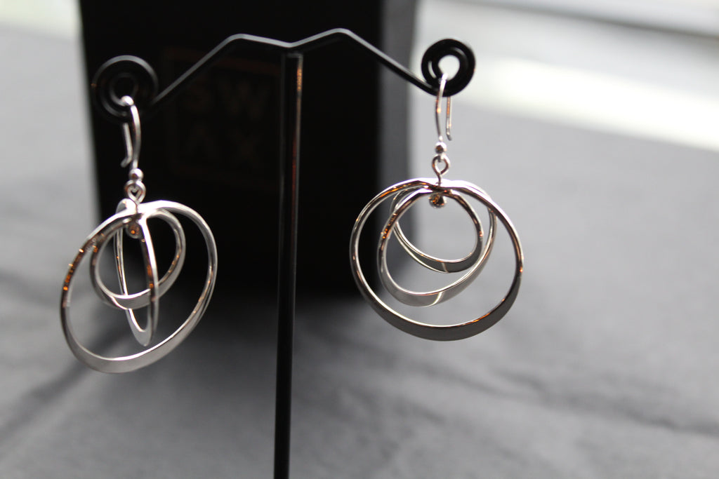 Twirling Silver Hoops Earrings
