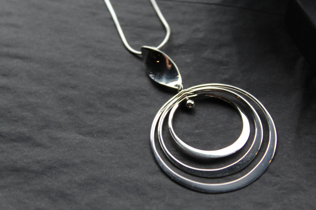 Twirling Silver Hoops Pendant with 18 - 20" Silver Chain