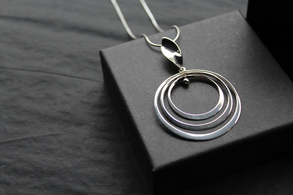 Twirling Silver Hoops Pendant with 18 - 20" Silver Chain