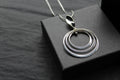 Twirling Silver Hoops Pendant with 18 - 20" Silver Chain