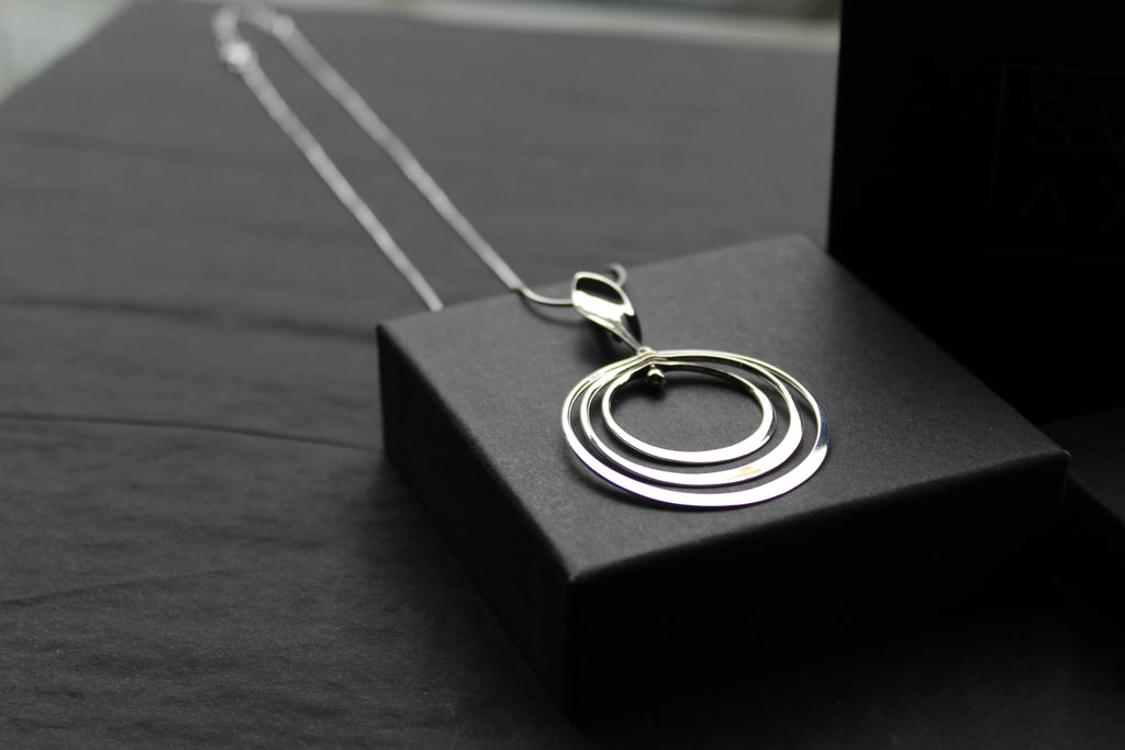 Twirling Silver Hoops Pendant with 18 - 20" Silver Chain