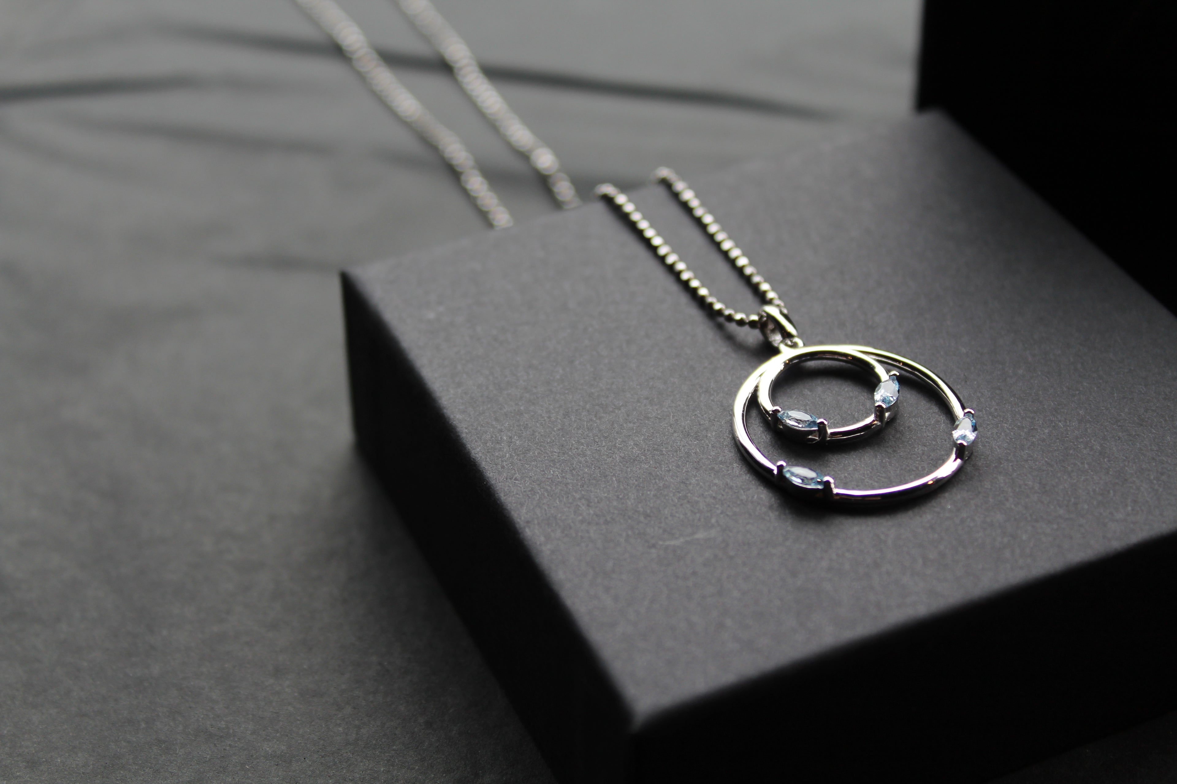 Aqua CZ Double Ring Pendant 18" Chain