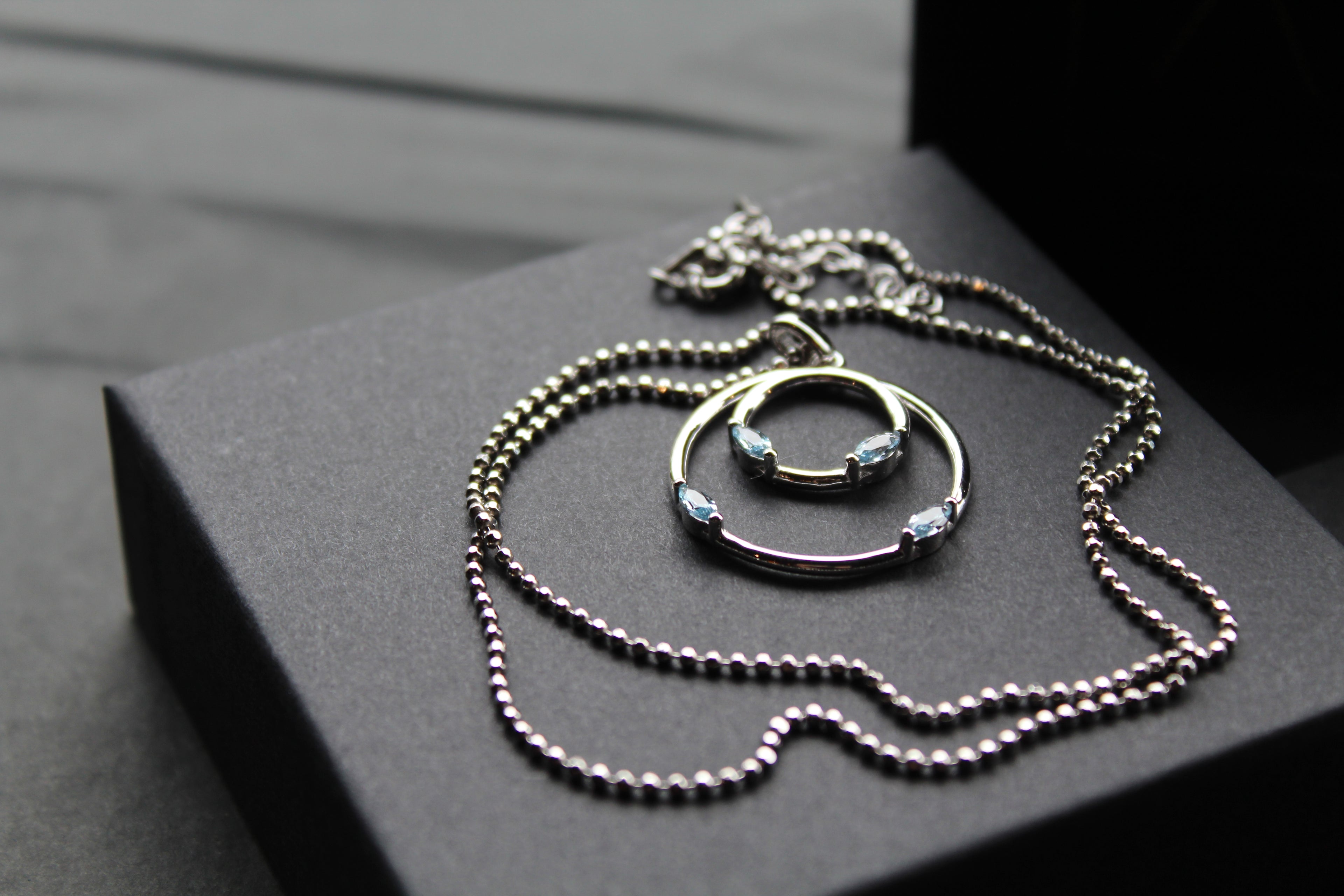 Aqua CZ Double Ring Pendant 18" Chain