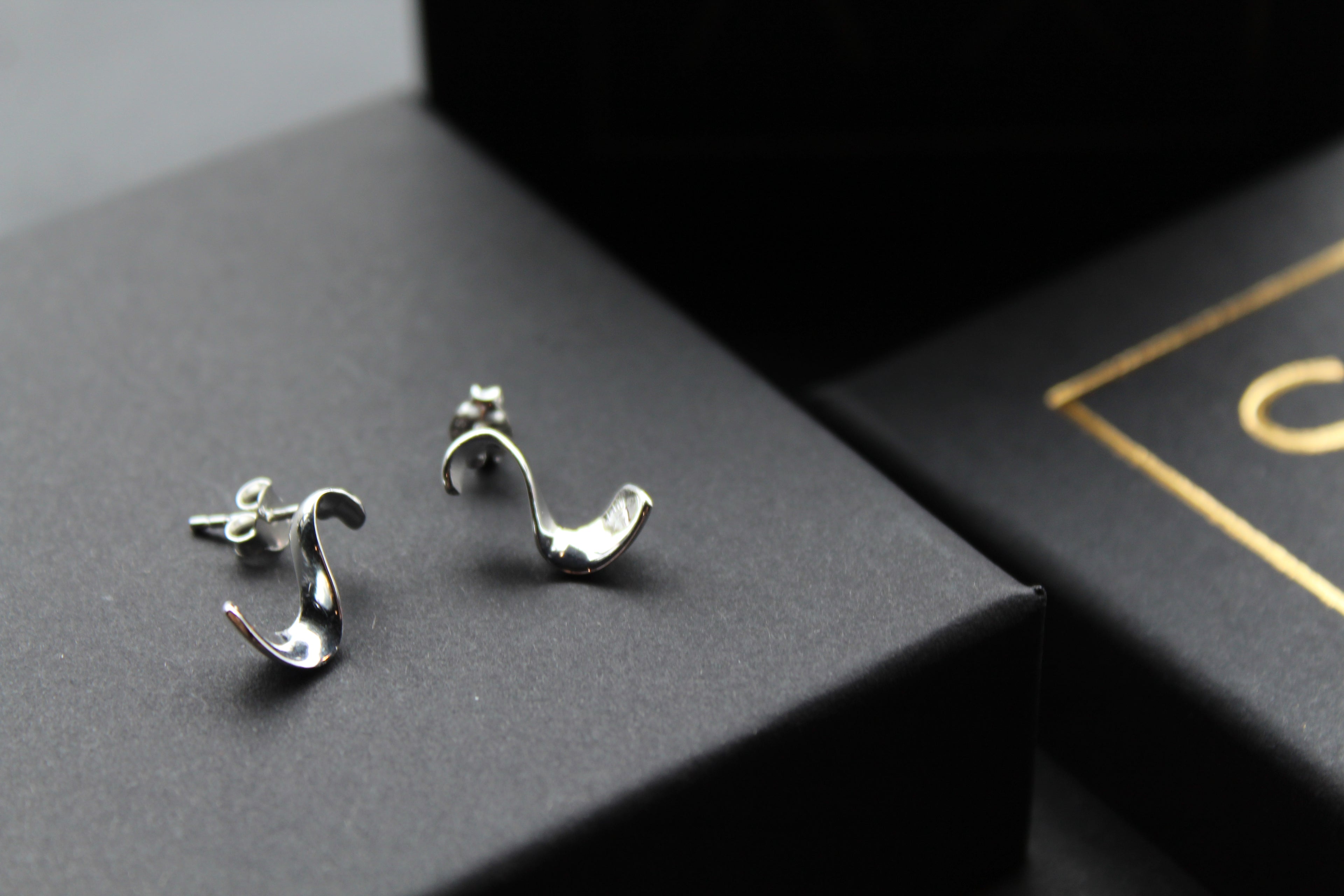 High Shine Swirl Stud