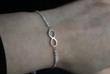 Load image into Gallery viewer, Infinity Slider Bracelet with Clear CZ Stones
