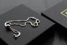 Load image into Gallery viewer, Infinity Slider Bracelet with Clear CZ Stones
