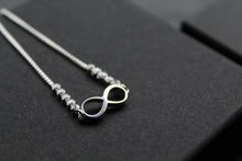Load image into Gallery viewer, Infinity Slider Bracelet with Clear CZ Stones
