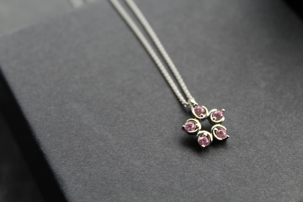 Pink Diamond Cubic Zirconia Flower Pendant with a 16-18" Silver Chain