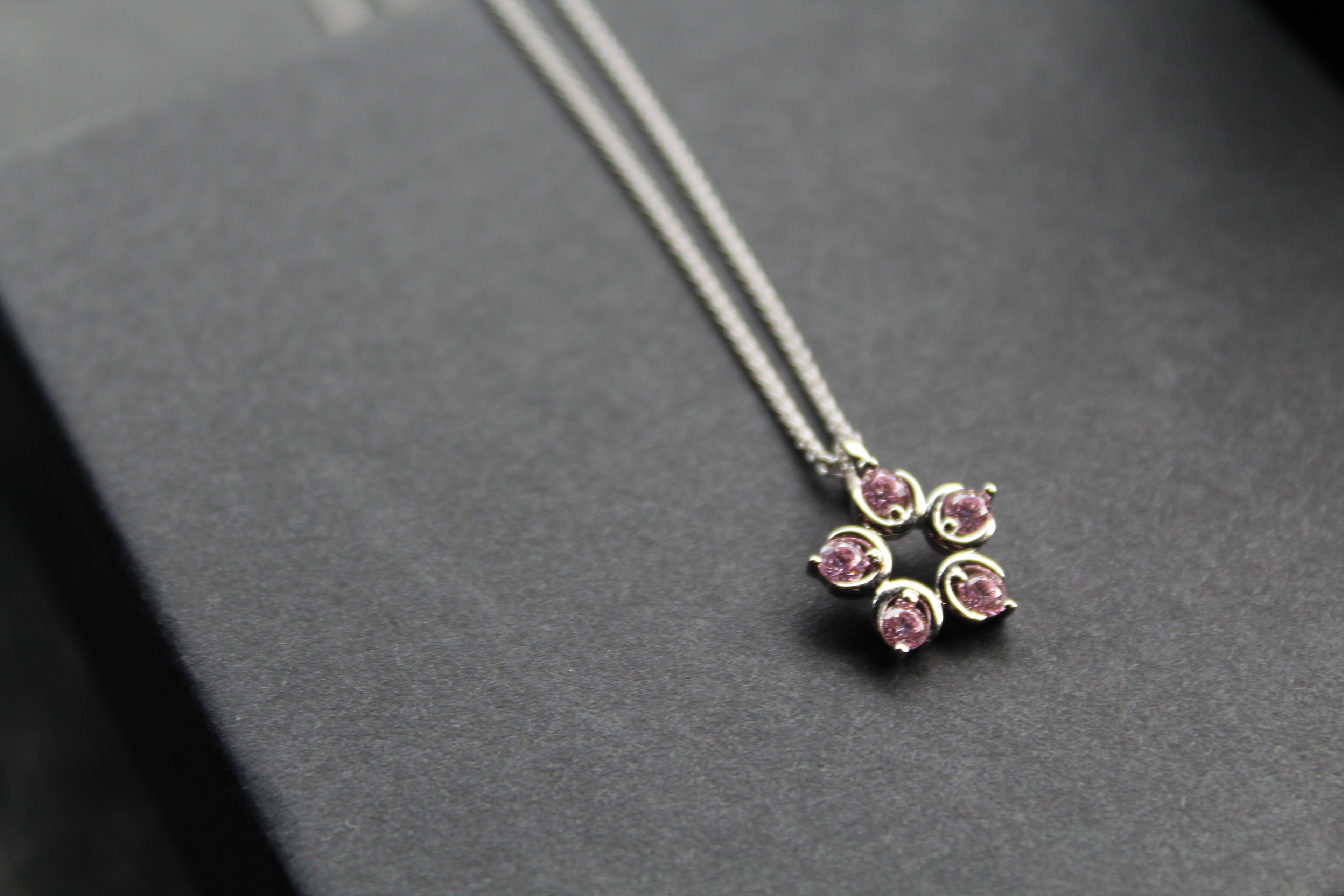 Pink Diamond Cubic Zirconia Flower Pendant with a 16-18" Silver Chain